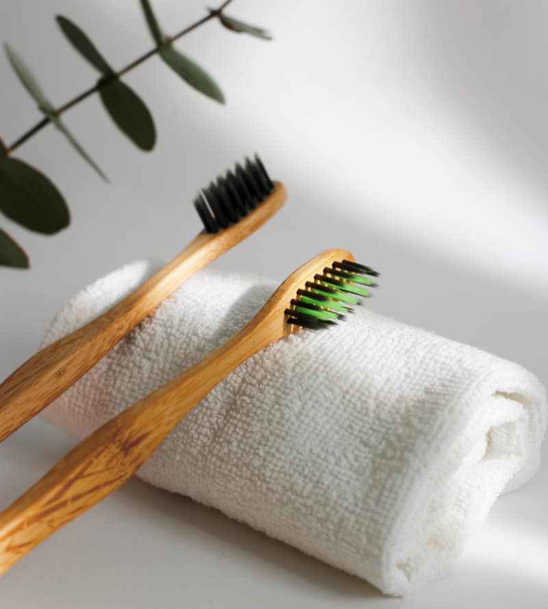 two bamboo toothbrushes 