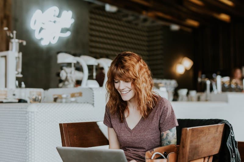 girl looking at green cryptocurrencies